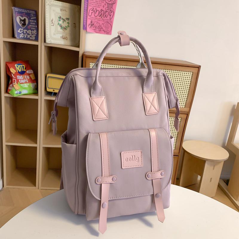Stylish Mommy Bag: Hand-held Baby & Mother Backpack for Light Travel