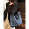 Französische lässige Denim-Stofftasche für Damen 2026 neue große Kapazität gestreifte Handtasche super beliebte Nischen-Umhängetasche