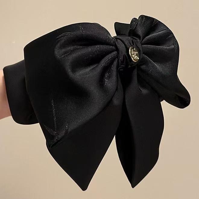 

Bamboo Shadow High-End Hair Claw Clip: Elegant, Luxurious & Volume-Enhancing Ponytail Accessory.