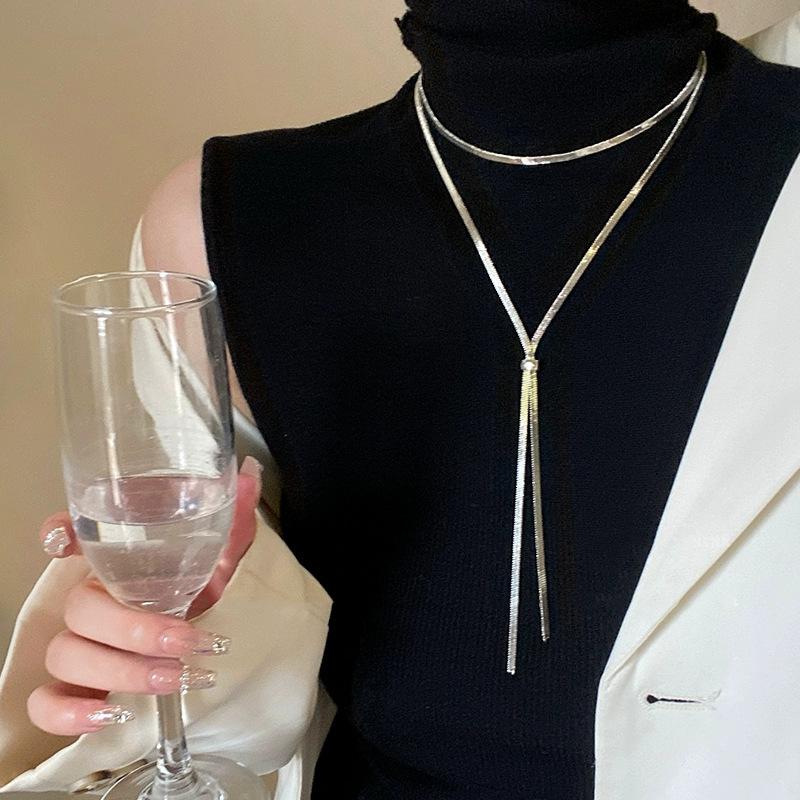 

Холодный ветер личность тянуть длинная бахрома металлическая змея кость цепь модный иностранный стиль продвинутый смысл простое разнообразие ношения шейная цепь