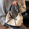 Korean version of niche foreign style portable bucket bag women's 2025 autumn new high-value suede bow shoulder bag