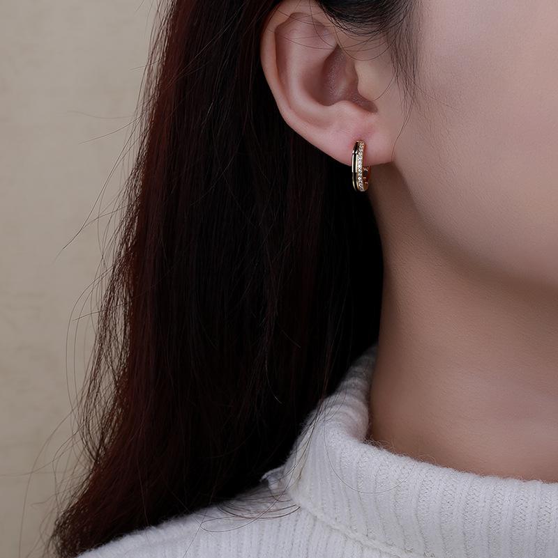European & American Retro S925 Silver Diamond Earrings with Unique Drop Design