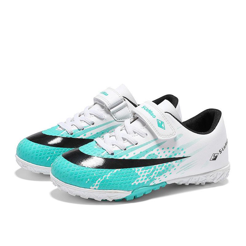 New football shoes boys and girls broken nails student Velcro artificial turf training shoes elementary school football shoes
