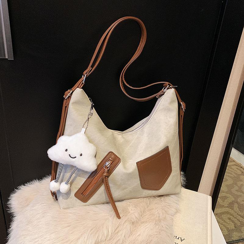 

New spring retro contrasting color large capacity simple crossbody shoulder 2025 commuting new niche design tote bag Without pendant хаки