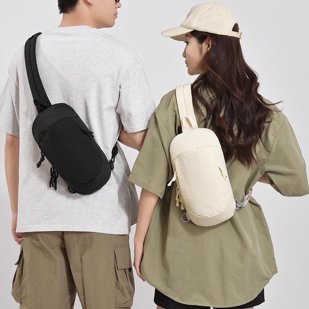 Trend casual messenger bag couple breast bag multi-functional versatile shoulder bag anti-theft brush men's and women's diagonal straddle bag