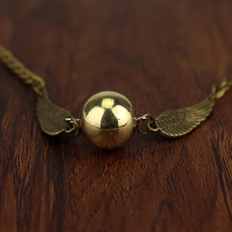 Harry Potter Deathly Hallows Bracelet: Electroplated Gold Snitch Design