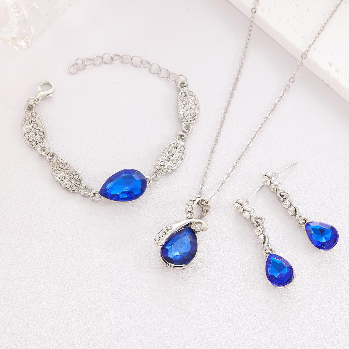 

Elegant Water Drop Jewelry Set: Diamond Leaf Bracelet, Necklace, & Earrings for Women, 3-Piece Collection CK0602 синій