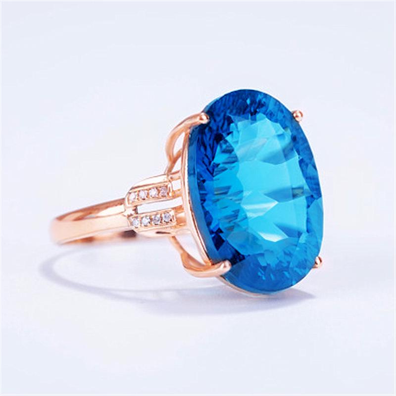 Roségoldplattierter Aquamarin- und Topas-Offener Ring mit ovalen, diamantbesetzten Farbsteinen