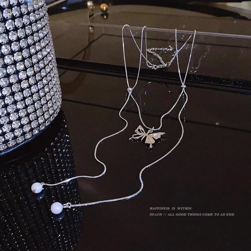 Pull-up Drawstring Butterfly Necklace Light Luxury Niche Pearl Tassel Silver Collarbone Chain Female