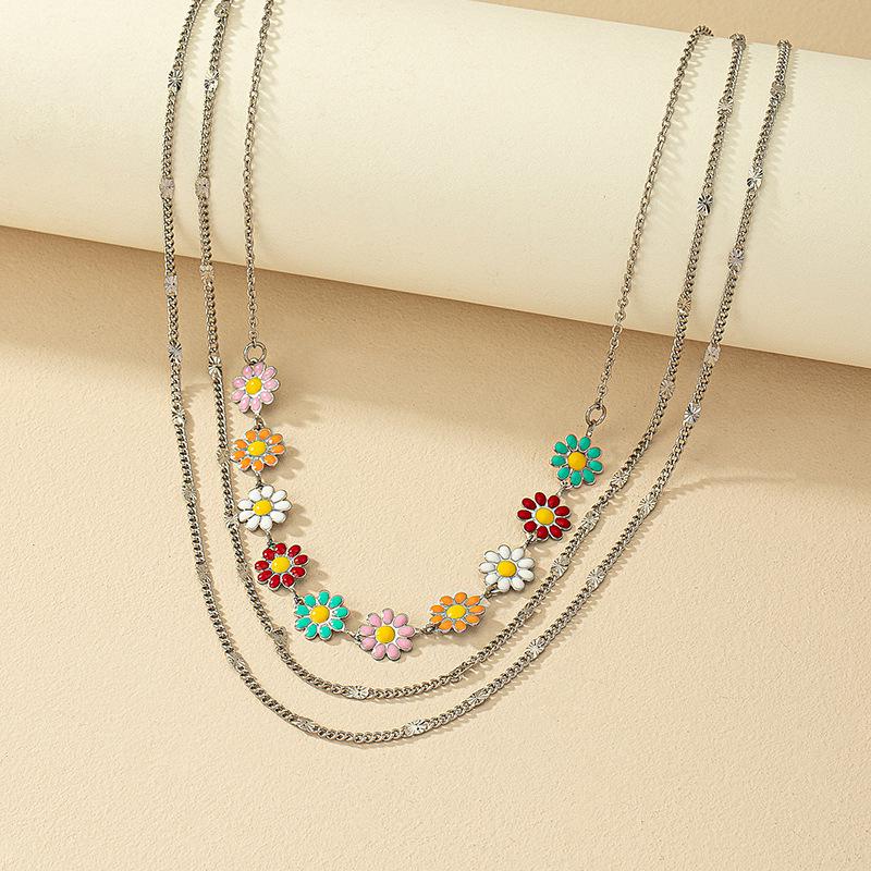 

Многослойное ожерелье с разноцветными ромашками - Женский нишевый модный тренд