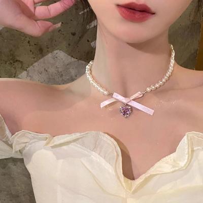 "Versatile French Pink Heart Bow Pearl Necklace for Women - Sweet Niche Design Clavicle Chain"