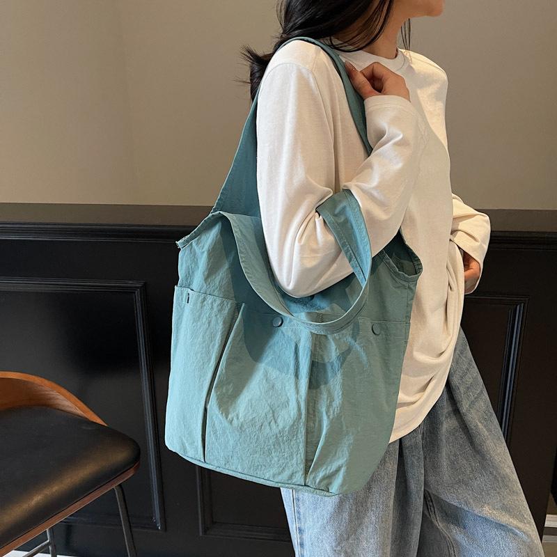 2025 spring tote bag casual simple small fresh fashion shoulder bag outdoor cloth bag solid color women