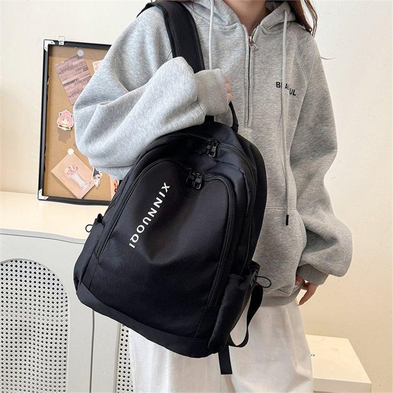 Schoolbag Korean version ins Large capacity backpack Male and female junior high school student schoolbag Personalized versatile trendy college 