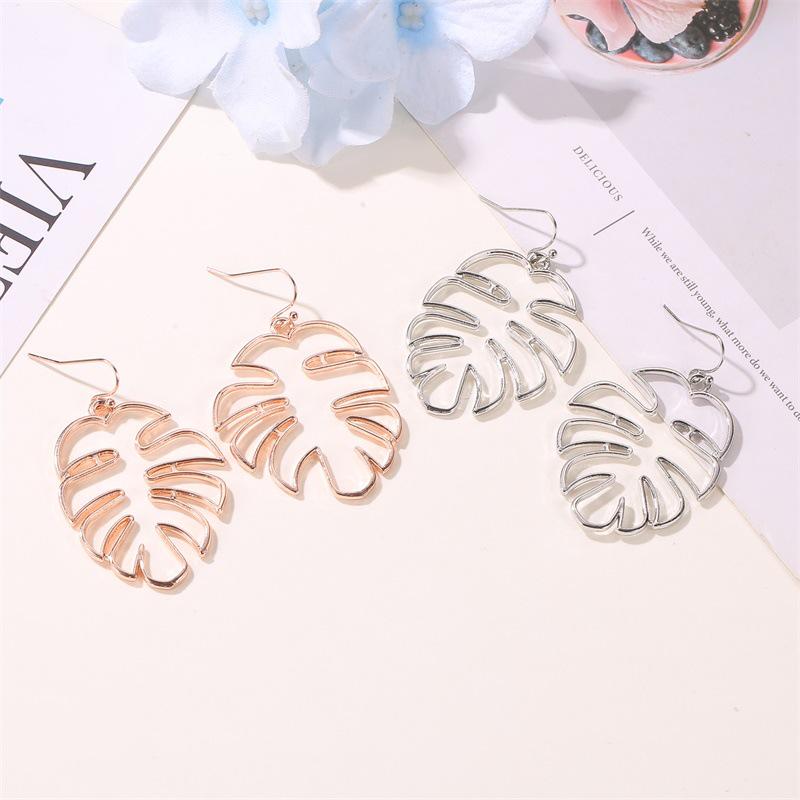 Ethnic Style Retro Hollow Leaf Stud Earrings - Banana Leaf Design for Women