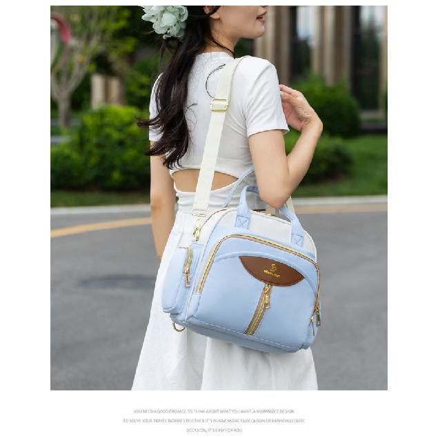 New mommy bag, multi-functional, large capacity, lightweight, with separate compartments for wet and dry items, can be carried as a backpack or