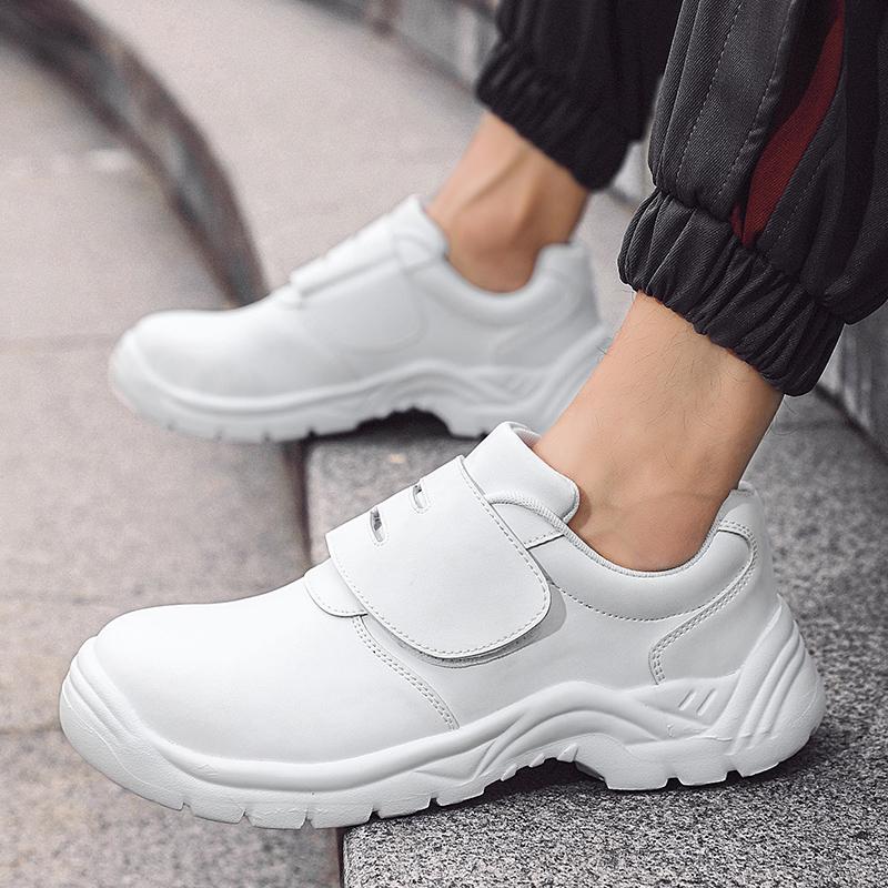 Herrenmode Stahlkappen Arbeitssicherheitsschuhe Weiches Leder Sicherheitsstiefel Schwarz Weiß Arbeiter Sichere Sneaker Schutzschuhe