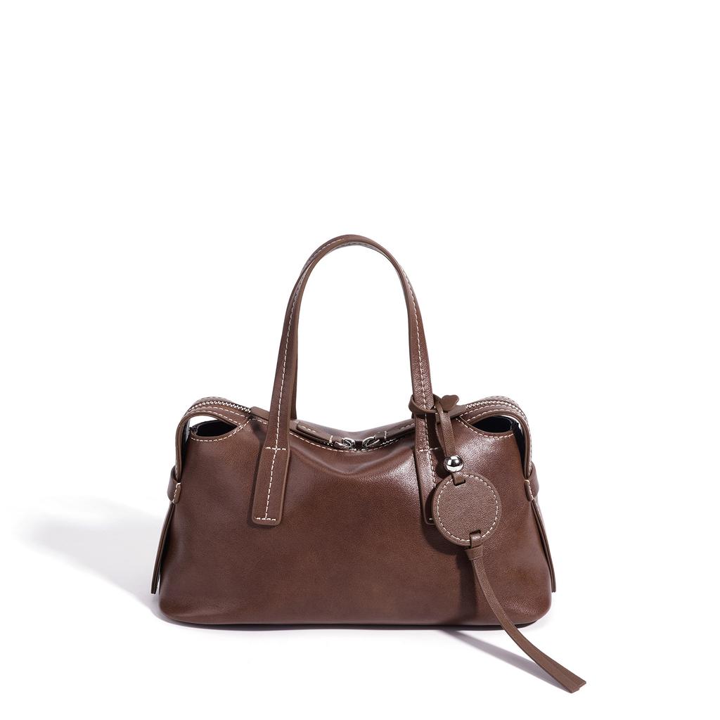 New French baguette bag made of top-layer cowhide, high-end genuine leather women's handbag, designed as a shoulder or underarm bag