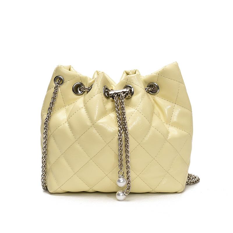 Beliebte Großhandelsnische Freizeit Rautenmuster tragbare plissierte Eimertasche Koreanische Mode vielseitige leichte Luxus Ketten Umhängetasche