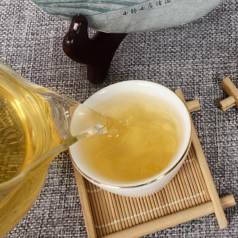 Pu'er Tea 2014 Spring Tea Ancient Tree Tea Yunnan Seven Seed Cake Tea 357g