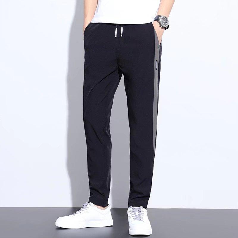 

Casual Trousers Men s Summer New Four-sided Elastic Thin Ice Silk Straight Pants Light Business Splicing Slim Pants M чёрный