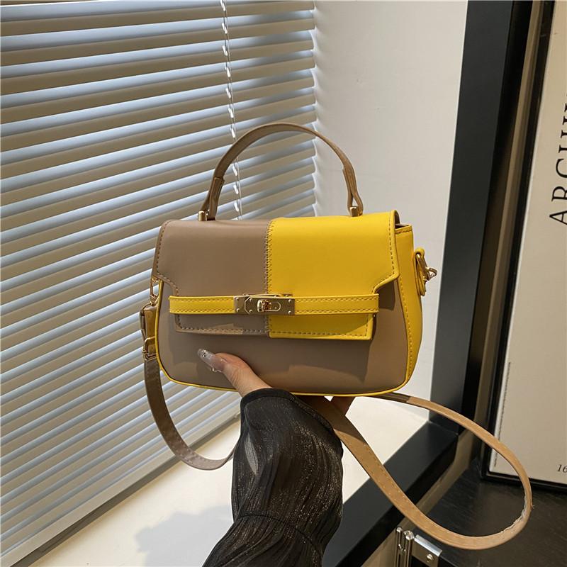 

Summer new product splicing contrasting color texture niche design sense high temperament simple shoulder crossbody handbag жёлтый