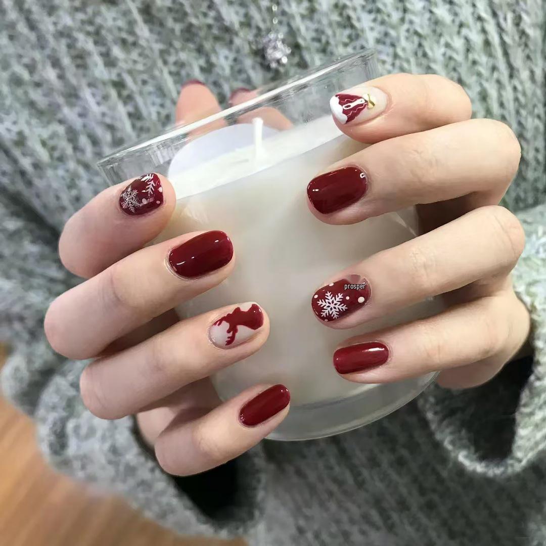 

C665 Cross-border Christmas & New Year Wearable Nails: White Reindeer, Snowman, Snowflake Nail Art Stickers. C665-Reindeer [Glue]