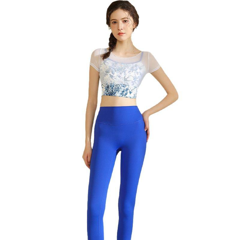 One-Shoulder Mesh Yoga Top with Chest Pads - Breathable, Hollow Design for Dance, Running, Fitness.