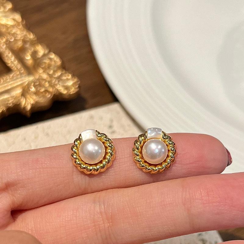 Natural freshwater pearl earrings s911 silver needle women's 11k gold injection niche design sense retro twist fritillary earrings