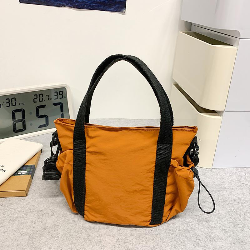 School bag Korean version ins Simple large-capacity messenger bag Versatile commuting to work and class Shoulder bag Outdoor sports small satchel
