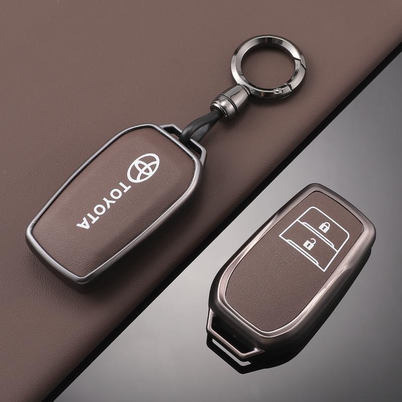 Läder Bilnyckel Fodral Fobskydd för Toyota RAV4 Crown Hilux Fortuner Yaris Prius Corolla Camry Land Cruiser Avensis Verso Prado C