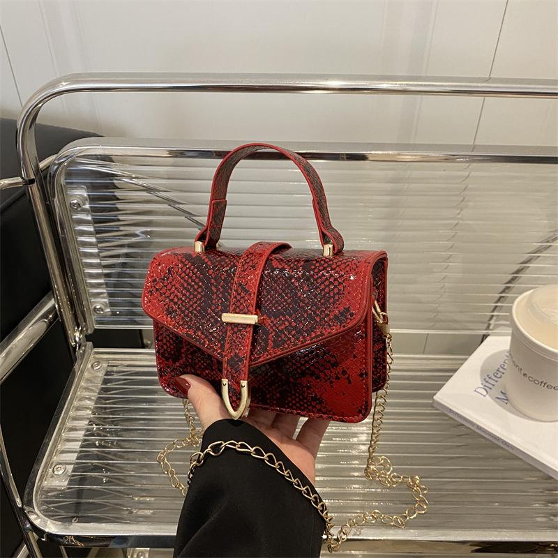 2025 Summer New Fashion Trend Snake Pattern Splicing Foreign Style Personality Design Sense Handbag Women's Shopping Messenger Bag