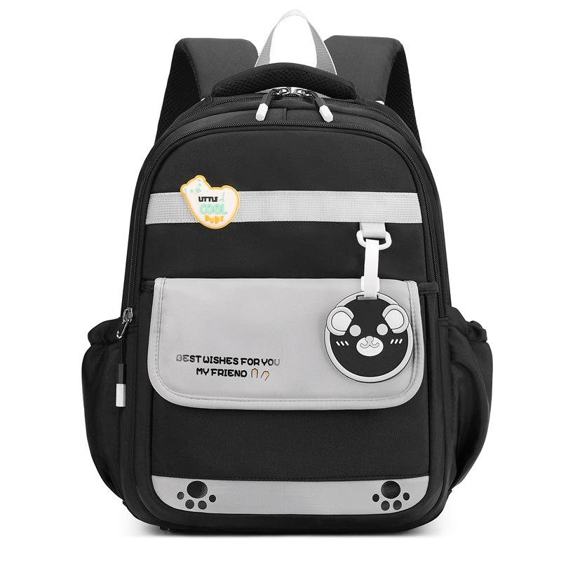 New spine protection for grades 1-6, waterproof boys' children's schoolbag and female primary school students' large-capacity college wind backpack