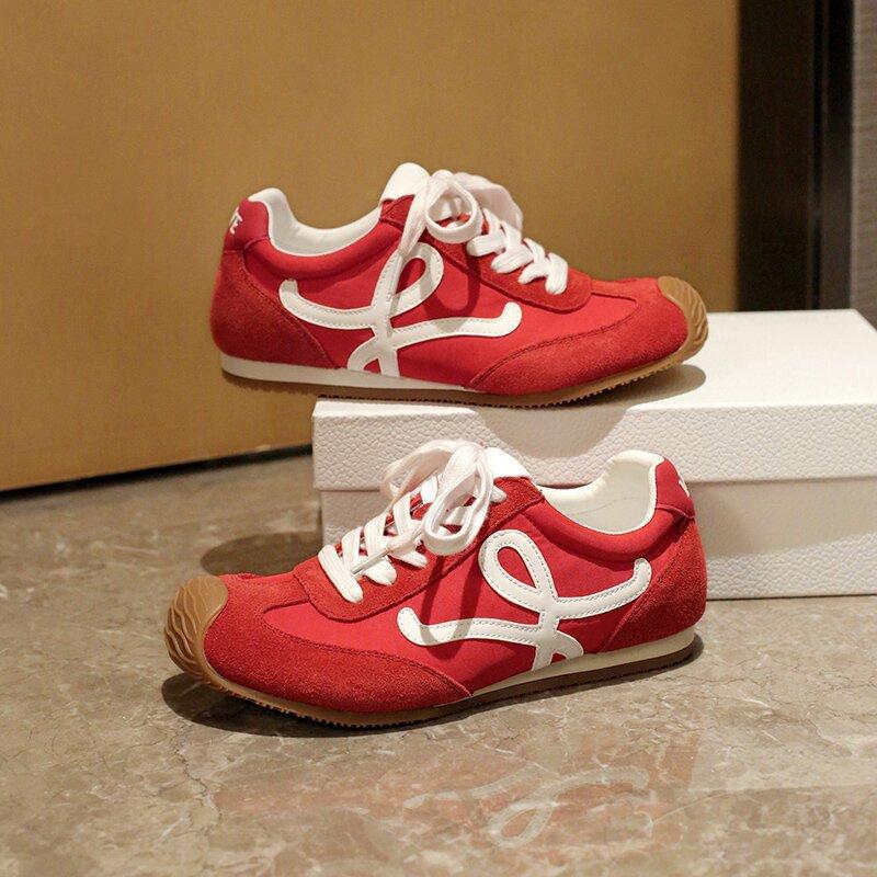 

Leather retro women s new crooked head lace-up casual sports little white shoes versatile 35