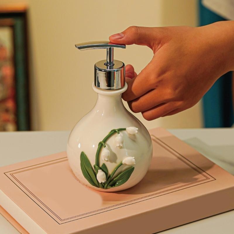 Sink Side Soap Pump Bottle with White Body and Flower Pattern for Bathroom Sink Use, Guest Bath Placement, and Hand Wash Bottle Access