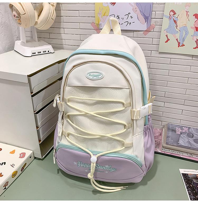 High-value cute primary school student spine care schoolbag female junior high school girl high school student backpack burden reduction
