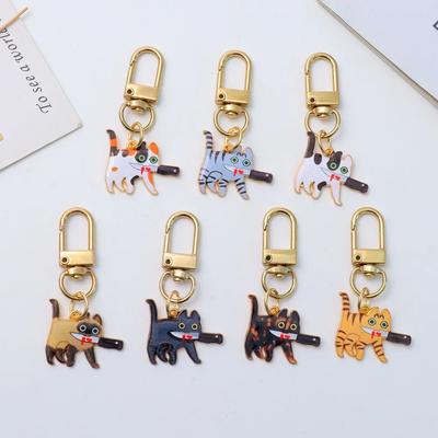 Mode Halloween Katze Schlüsselanhänger Kreative schwingende Messer Assassin Katze Schlüsselanhänger Rucksack Anhänger DIY Auto Schlüsselanhänger Schmuck Geschenk