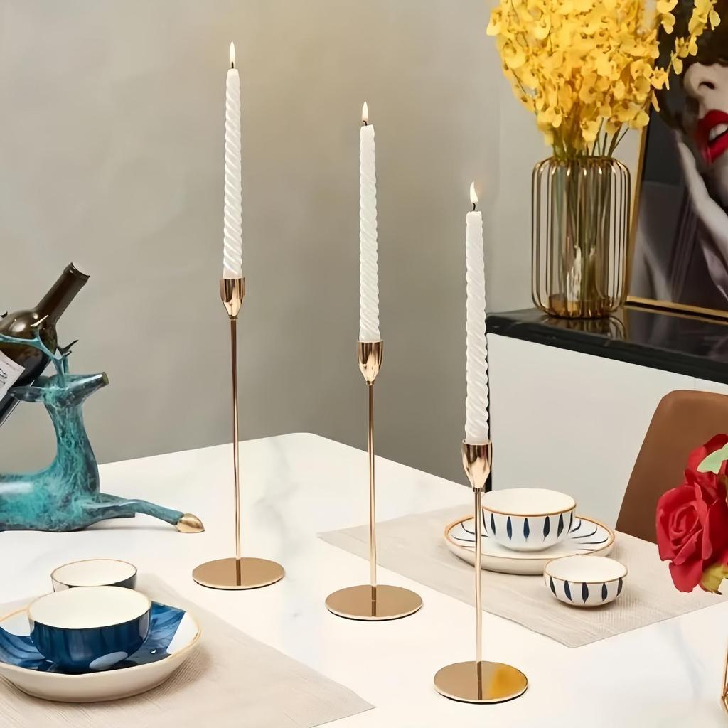 Elegant European Candle Holder Set: Electroplated Three-Piece Metal Ornament for High-End Dining and Wedding Décor.