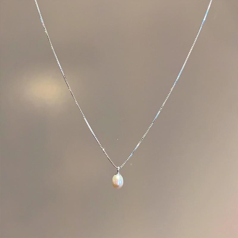 Camellia Pearl Tassel Necklace: Elegant Silver Clavicle Pendant for Women