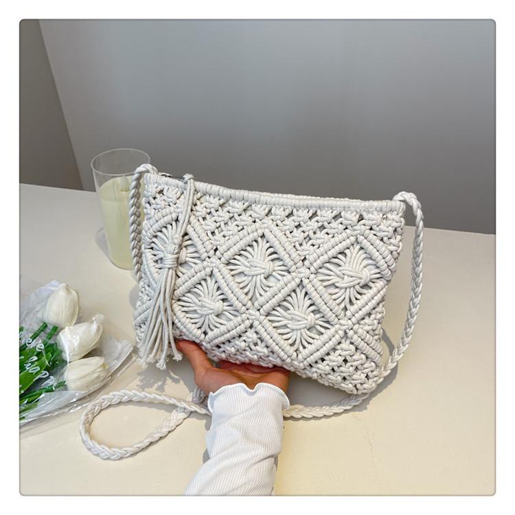 Frühling und Sommer Nische hohle gestrickte Baumwolltasche kleine quadratische Tasche neue Urlaubs-Umhängetasche Messenger-Tasche