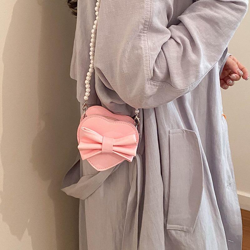 Summer new Korean version heart-shaped bow women's bag small bag foreign style shoulder bag solid color small bag messenger bag women