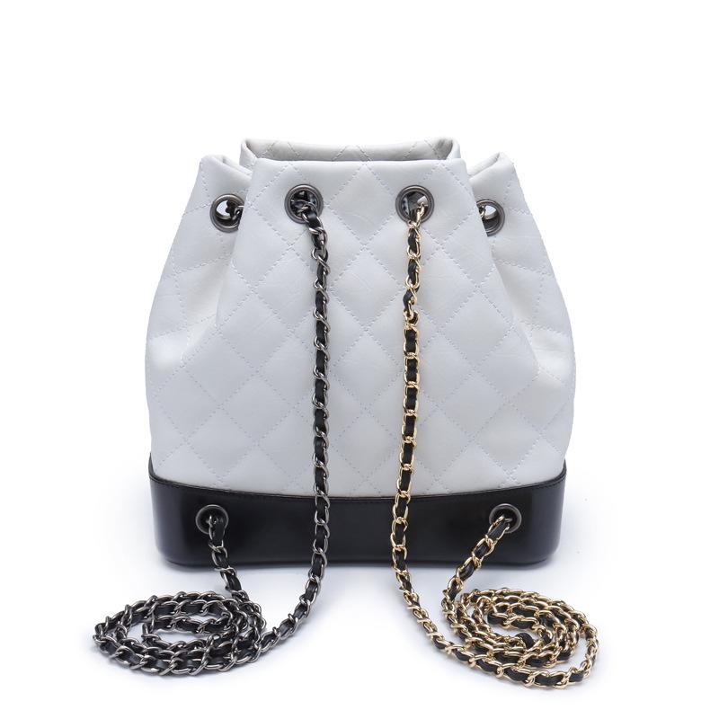 Neue koreanische Version Mode Rindsleder Rautenmuster Kette Kleiner Rucksack Einzelner Rucksack Umhängetasche Echtes Leder Eimer Damen Tasche