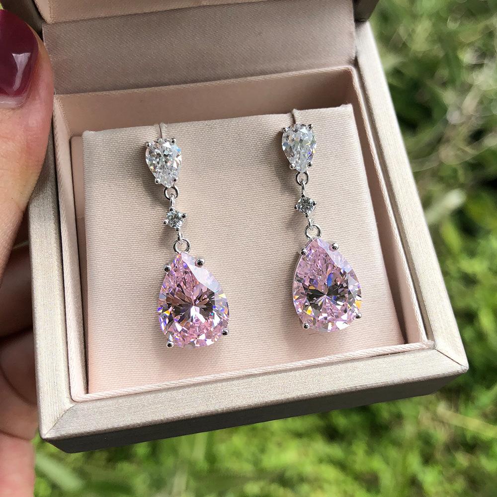 Las joyas Tancise10 * 14 tienen incrustaciones simples de aretes de diamantes con alto contenido de carbono en forma de gota rosa para aretes con soporte independiente para mujer.