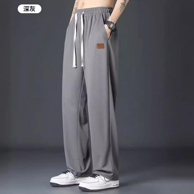 Koszule i mniej ubrań codzienne spodnie chłopięce spodnie z lodowego jedwabiu letnie cienkie nowe proste luźne drapujące spodnie dresowe