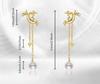 Elegant Pearl Earrings: New Chinese Style, Copper-Plated Silver with a Unique Gold Design