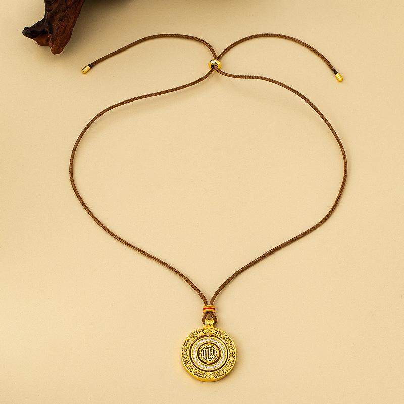 New Chinese sand gold hollow out time comes and goes compass pendant woven rope necklace women's fashion temperament rotating sweater chain