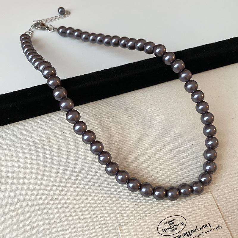 Fashion versatile color matching pearl necklace retro niche high-end sense collarbone chain personality light luxury design sense necklace women