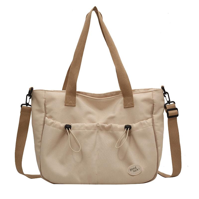 Women s shoulder messenger bag 2025 new large-capacity student class handbag fashionable and simple solid color canvas bag покинуть белый 2329₽