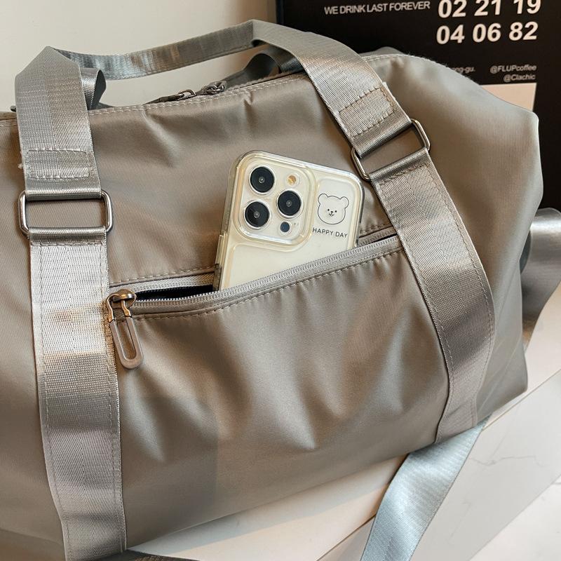 Korean version of fashion short-distance travel bag women's shoulder carry large-capacity luggage travel business travel bag men