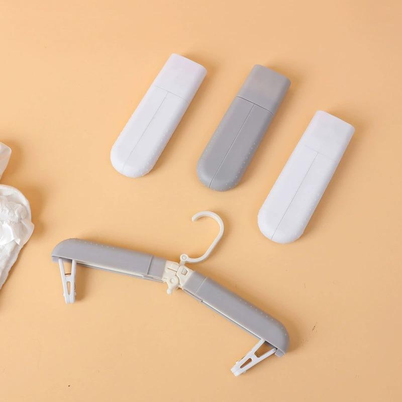 Percha plegable portátil para viajes, tendedero multifuncional para ropa, organizador de hogar