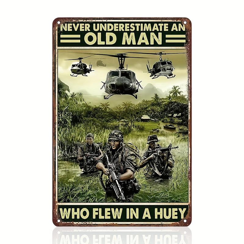 

Vintage Military Huey Helicopter Iron Wall Art Weatherproof Metal Decor with SoldierHelicopter Scene Never Underestima 20x30cm（7.8x11.8inch）